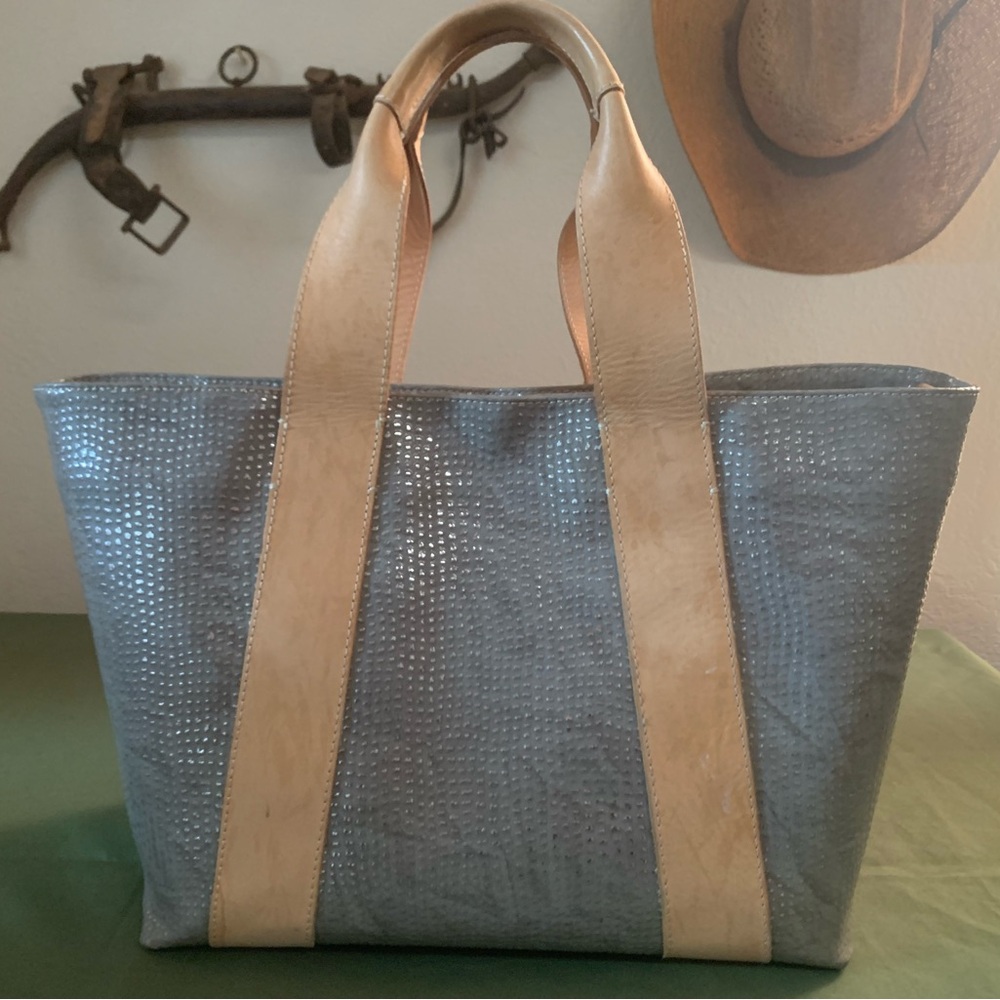 Consuela bag like new. Has extra strap that has never been used
